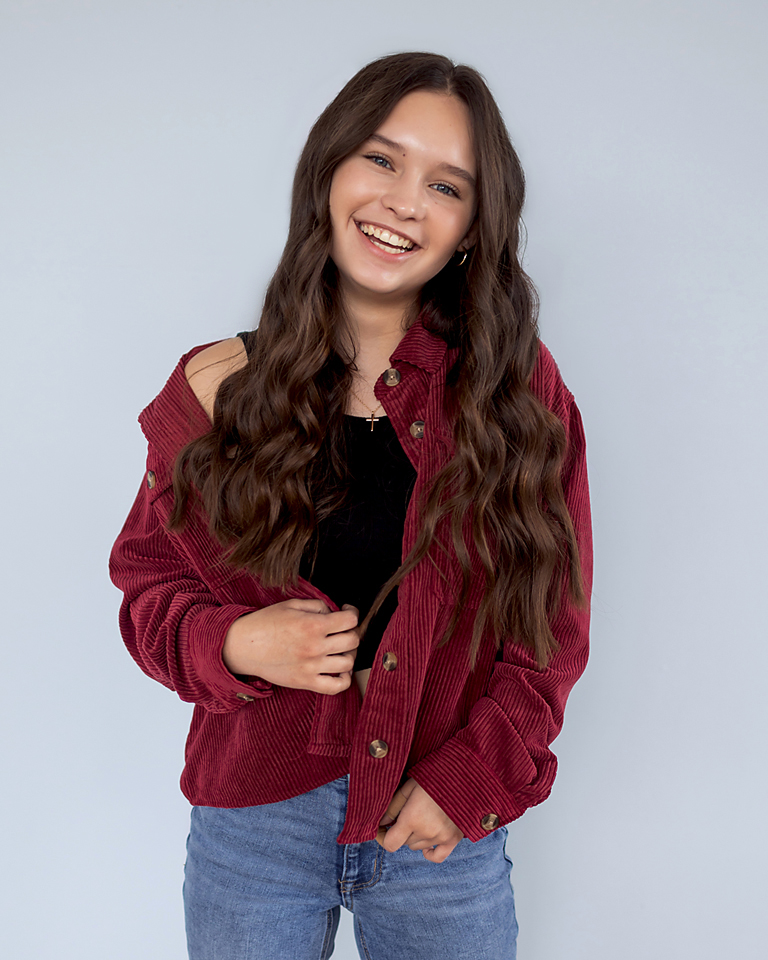 gorgeous teen girl laughing natural studio shoot