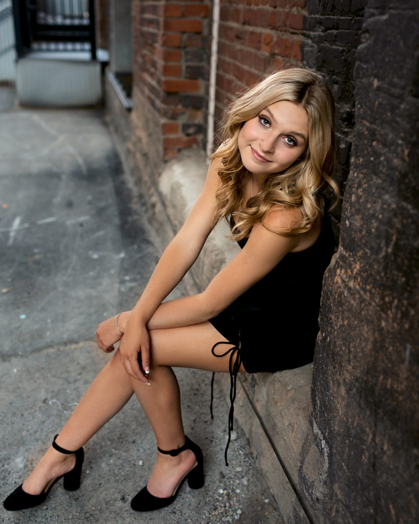 beautiful girl in alley for photo shoot