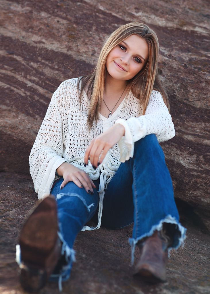 teenage girl in cowboy boots for photo shoot